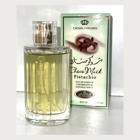 Al Rehab Choco Musk Pistachio 50ml bottle next to its box, photographed at the Sheikh Scents shop
