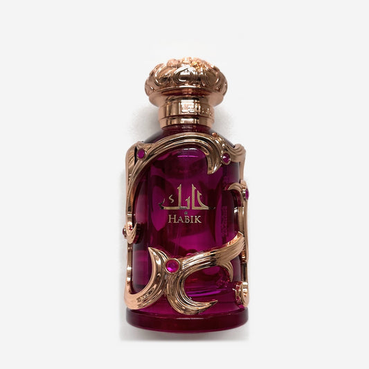 Lattafa Habik for Women bottle, fuchsia glass with a rose gold cage