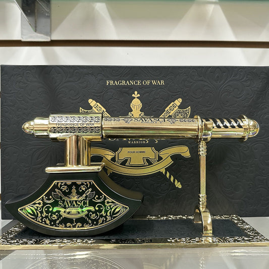 J. Junaid Jamshed Savasci axe-shaped bottle on its stand in front of the box, photographed at the Sheikh Scents shop